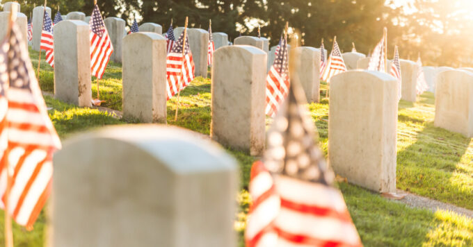 Tombstones in a military cemetery in the morning